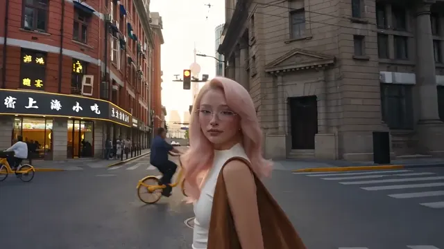 Pink-haired woman on a Shanghai street with warm light across the portrait